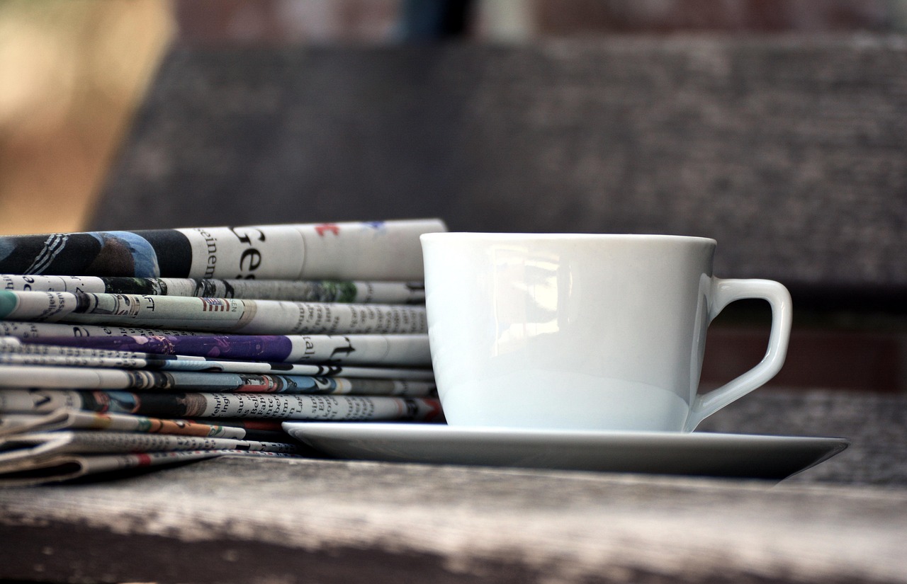 Cup, newspapers, magazines — Compare Medicare Supplement Plan N Options to Manage Healthcare Costs